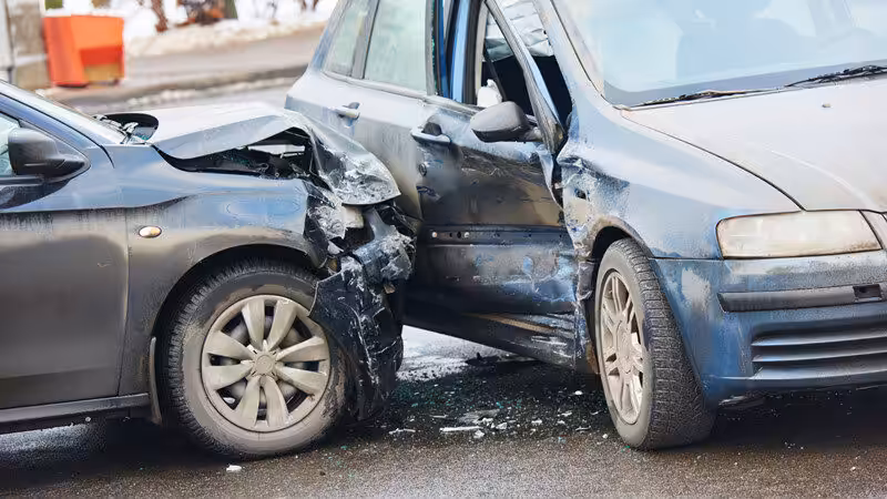 Two-Vehicle Crash at E Main St & S Maney Ave Results in Injuries
